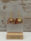 Orange Textured Arch Dangles with Gold Flower Charms