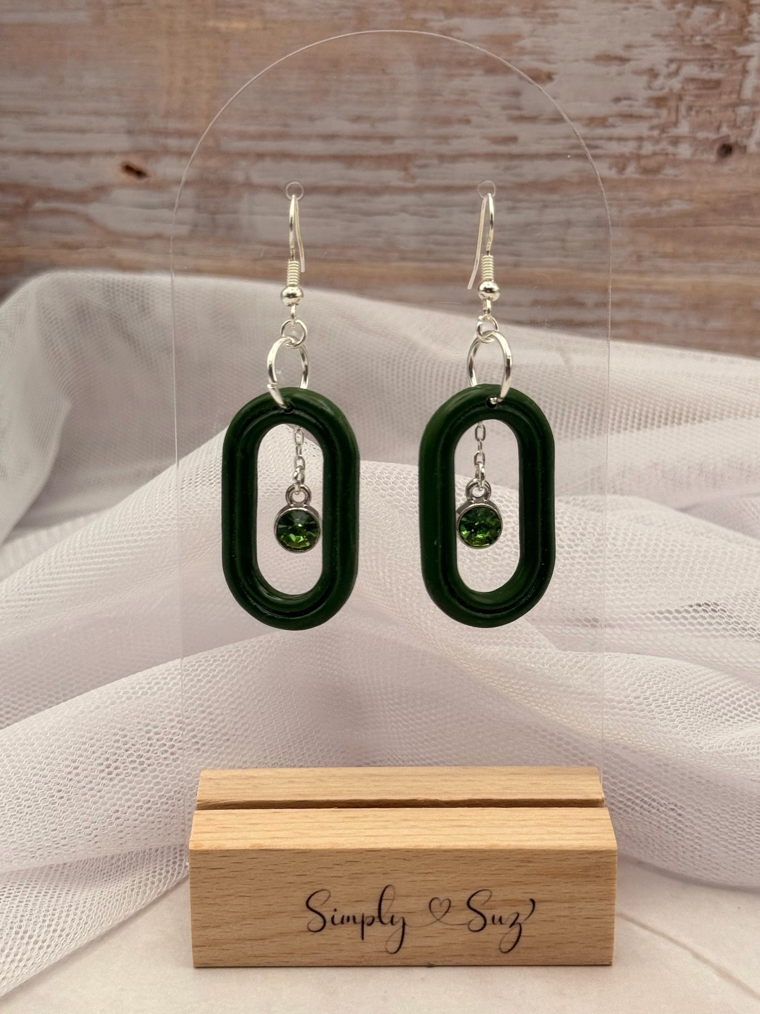 Dark Green Open Oval Dangles with Crystal Charm